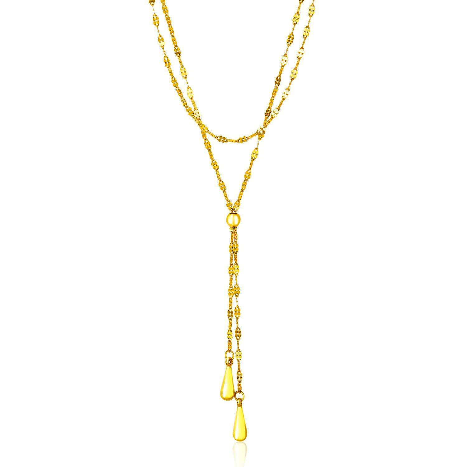 14k Yellow Gold Double Strand Chain with Puffed Heart Lariat Necklace in a sleek high-contrast midnight luxury editorial styl